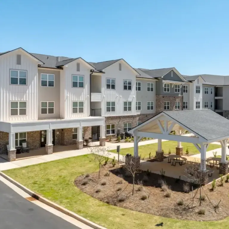 view of building elevation on a sunny day at Pointe River apartments in Albany GA