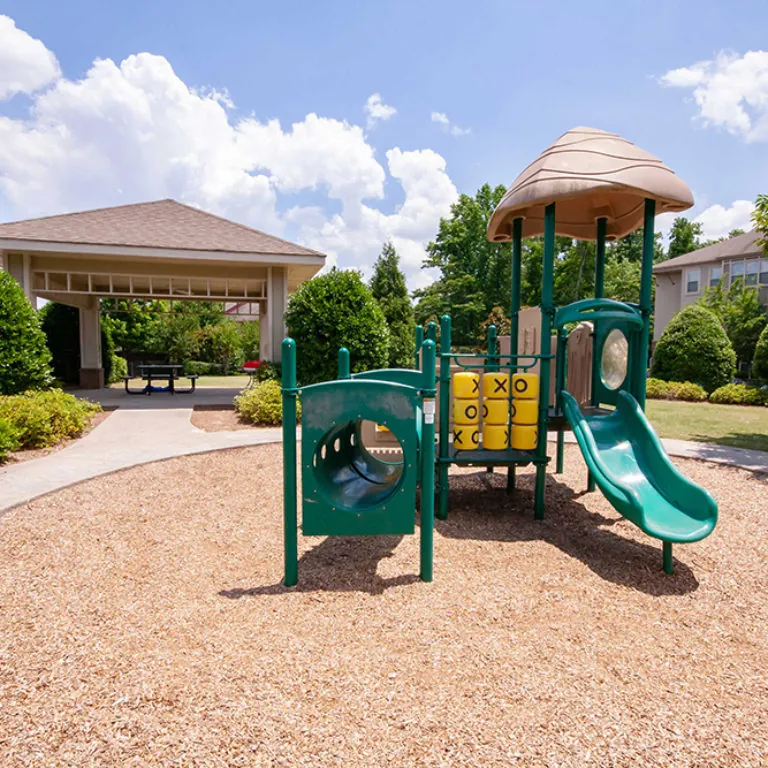 Playground at Columbia Grove Community - Apartments in West Midtown Atlanta, GA